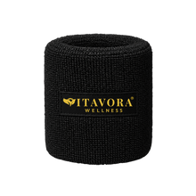 Single Vitavora Wellness Power Circle Wristband standing upright, showcasing the black and gold branded logo patch on a white studio background.